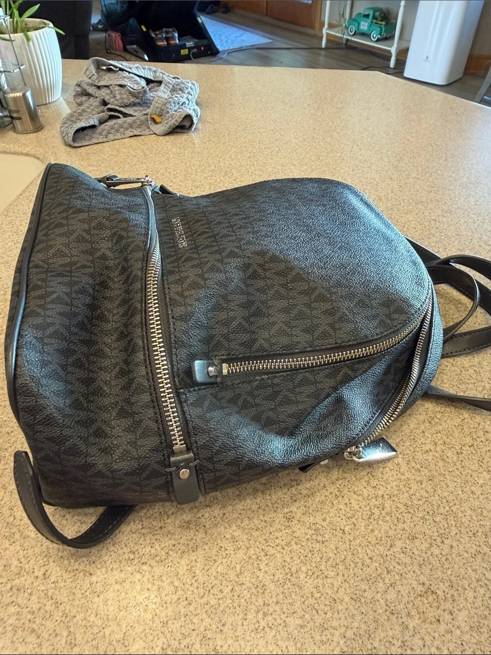 Michael Kors Black Logo Zip-Front Backpack Unisex
